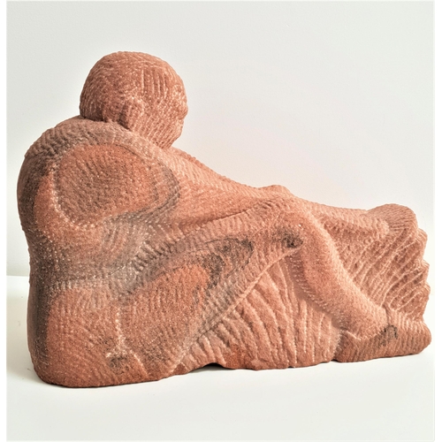 278 - A.R.CAMERON
chip carved red sandstone figure of a seated man, monogrammed and dated ARC '91, 42cm lo... 