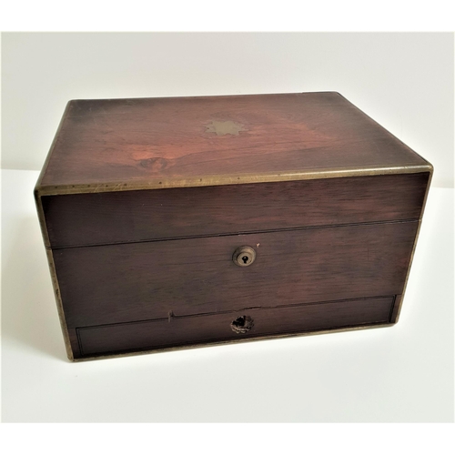 285 - 19th CENTURY ROSEWOOD AND BRASS INLAID WORKBOX
the fitted interior with glass bottles and glass cont... 