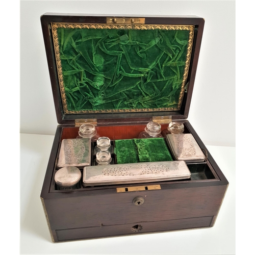 285 - 19th CENTURY ROSEWOOD AND BRASS INLAID WORKBOX
the fitted interior with glass bottles and glass cont... 