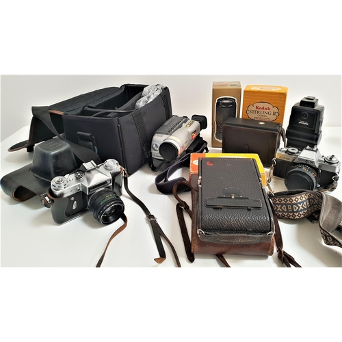 288 - SELECTION OF CAMERAS AND CAMERA EQUIPMENT
including a Cannon 8mm camcorder and case, Zenit E 35mm ca... 