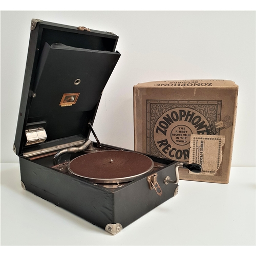 405 - HMV GRAMOPHONE
in a hard shell case, together with twenty seven records