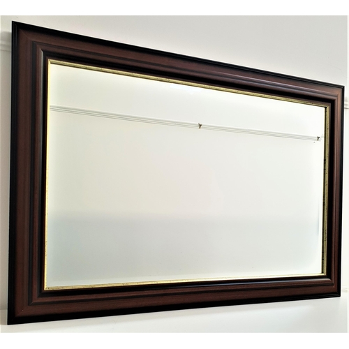 496 - MAHOGANY WALL MIRROR
with a rectangular bevelled plate, 71cm x 101cm