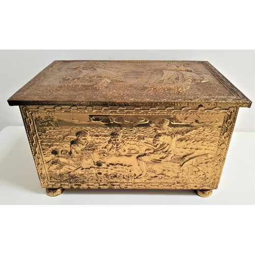 506 - EMBOSSED BRASS COAL BIN
decorated with a nautical theme, with a lift up lid and standing on bun feet... 