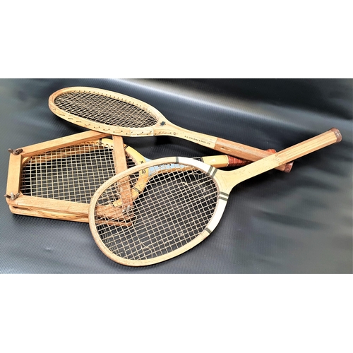 414 - THREE VINTAGE WOODEN TENNIS RACKETS
a Hexagon Champion, a Spalding Claremont and a Wilson Baseline (... 