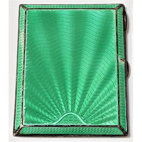 157 - GEORGE V SILVER AND ENAMEL CIGARETTE CASE
with green guilloche enamel to the front and engine turned... 