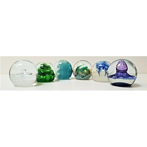 235 - SELECTION OF SIX GLASS PAPERWEIGHTS
including one marked to the base 'Peter Holmes Sample 19/12/75',... 