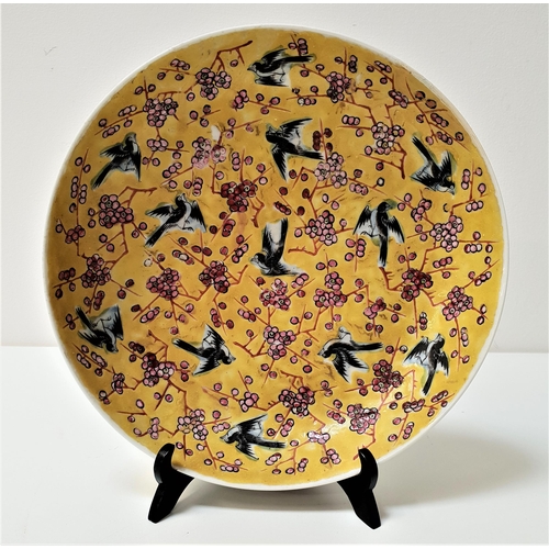 244 - CHINESE FAMILLE ROSE YELLOW GROUND BOWL
decorated with magpies and blossom, with a six character mar... 