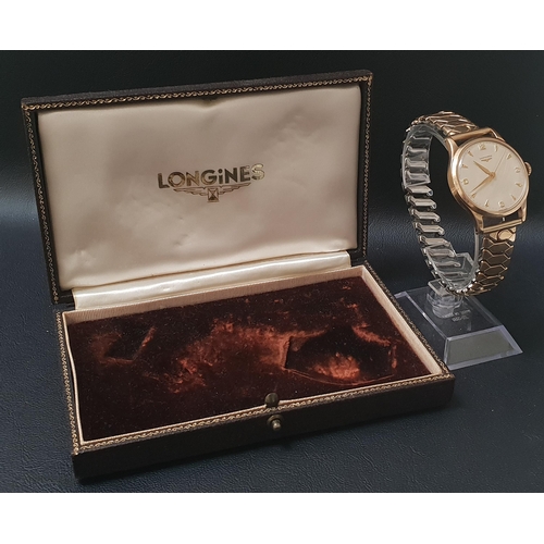 26 - GENTLEMAN'S NINE CARAT GOLD CASED LONGINES WRISTWATCH
the dial with Arabic 3, 6, 9 and 12 together w... 