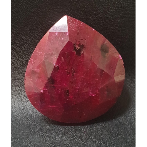 85 - CERTIFIED LOOSE NATURAL RUBY
the pear cut ruby weighing 891.2cts, with GLI Gemmological Report