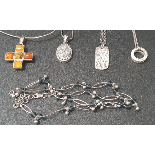 105 - FIVE SILVER AND SILVER  MOUNTED PENDANTS/NECKLACES
including an amber set cross pendant and a marcas... 