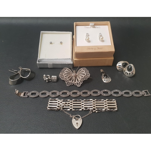 111 - GOOD SELECTION OF SILVER JEWELLERY
comprising a pair of onyx set Native American Bear claw design ea... 