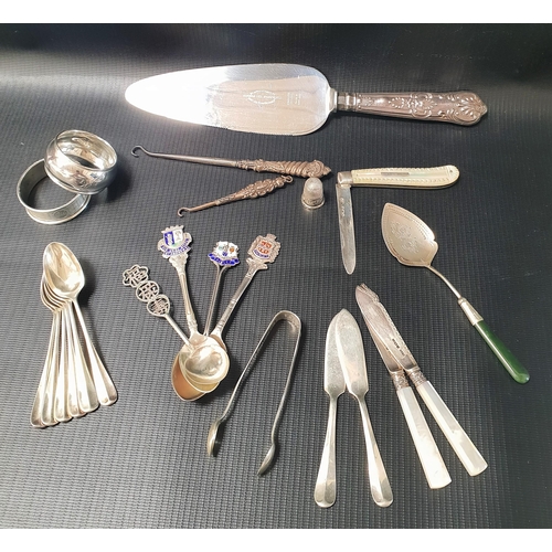 166 - MIXED LOT OF SILVER
including a silver handled cake slice, Sheffield 1963, two napkin rings, Birming... 