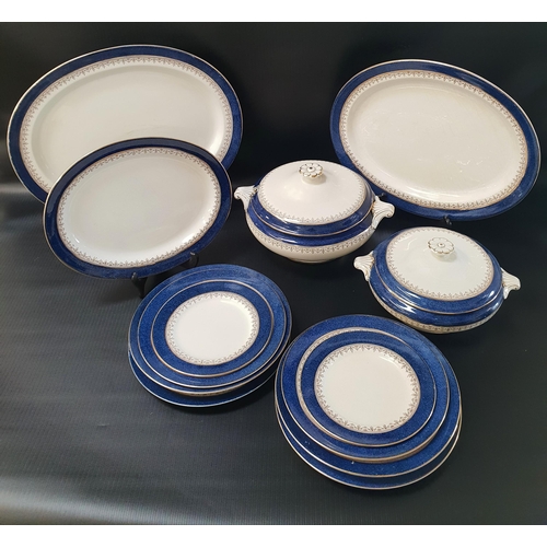 225 - BOOTHS SILICON CHINA DINNER SERVICE
decorated with a blue border with gilt highlights, comprising tw... 