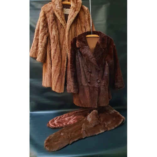 403 - LADIES BROWN MINK JACKET
with three quarter length sleeves and a label 'Moray Glasser of Glasgow', a... 