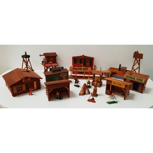 440 - CHILDREN'S COWBOYS AND NATIVE AMERICAN WOODEN TOWN SET
comprising a Saloon Bar, Jail, Silver Fox pad... 