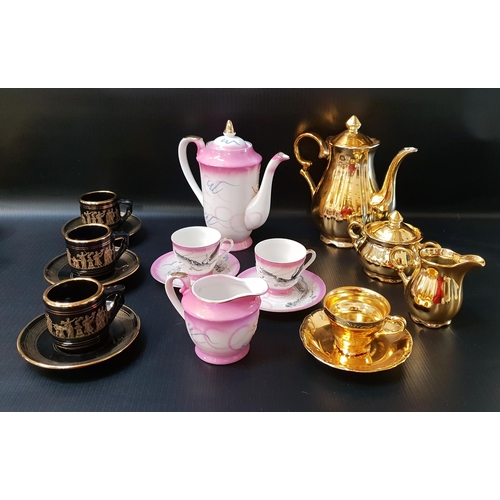 265 - GILT COFFEE SET
comprising six cups, four saucers, cream jug, lidded sugar bowl and lidded coffee po... 