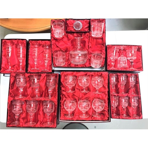 227 - SELECTION OF BOXED STAFFORDSHIRE CRYSTAL GLASSWARE
all with etched decoration, comprising four champ... 