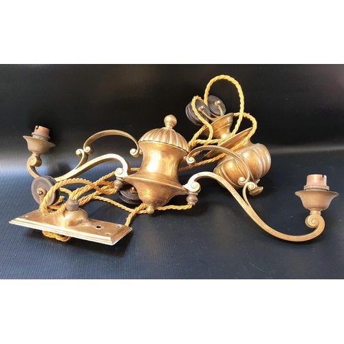 593 - EDWARDIAN BRASS RISE AND FALL LIGHT
with a twin scroll arm with two light fittings