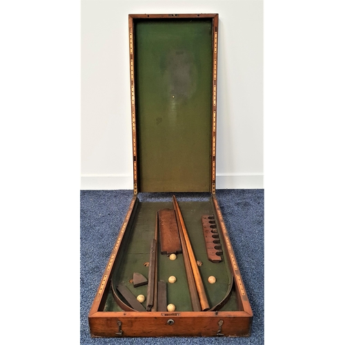 445 - VINTAGE TABLE TOP BAGATELLE TABLE
in a mahogany baize lined folding case, 182cm long