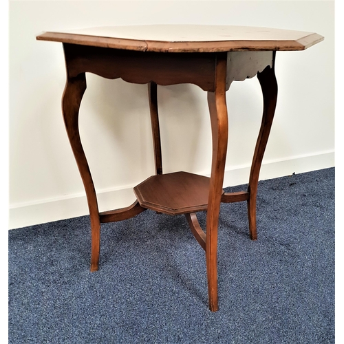 582 - EDWARDIAN MAHOGANY WINDOW TABLE
with an octagonal top standing on shaped supports united by an under... 