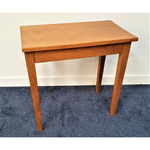 594 - LIGHT OAK OCCASIONAL TABLE
with a rectangular top standing on tapering supports, 63.5cm wide