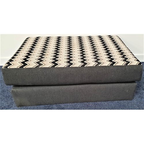 605 - RECTANGULAR FOOTSTOOL
with a woven grey base and woven grey and geometric pattern covered cushion, 9... 