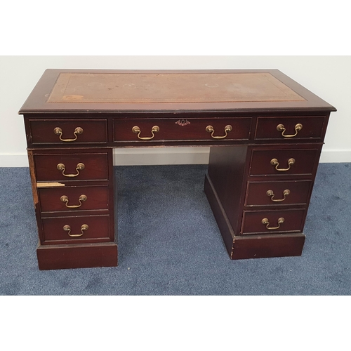 508 - MAHOGANY KNEEHOLE DESK 
with an inset leather top above an arrangement of seven drawers and a small ... 