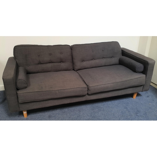 604 - LARGE SOFA
with button back loose cushions and side bolster cushions in a woven grey fabric, standin... 