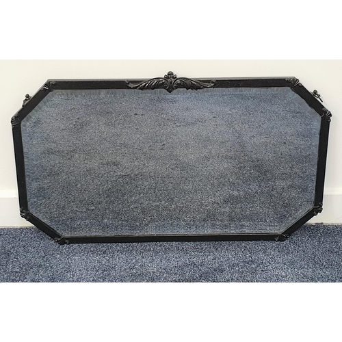 606 - METAL FRAMED OCTAGONAL WALL MIRROR 
with a bevelled plate, 68.5cm wide