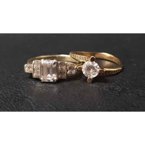 69 - TWO CX SET RINGS
one a cluster ring in nine carat gold, ring size N-O; and the other a single stone ... 