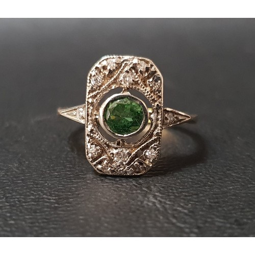 94 - ART DECO STYLE TSAVORITE GARNET AND DIAMOND DRESS RING
the central round cut garnet approximately 0.... 