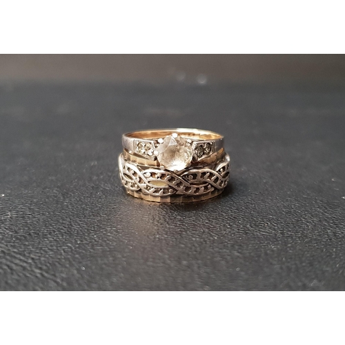 95 - TWO NINE CARAT GOLD RINGS
comprising one band formed with central entwined white gold band with yell... 