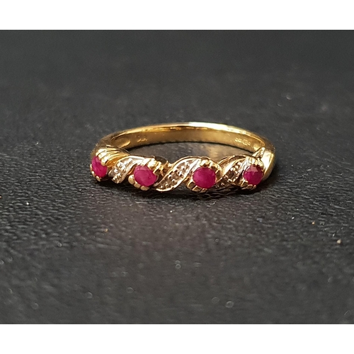 138 - RUBY AND DIAMOND RING
the four round cut rubies in wavy entwined setting and separated by small diam... 