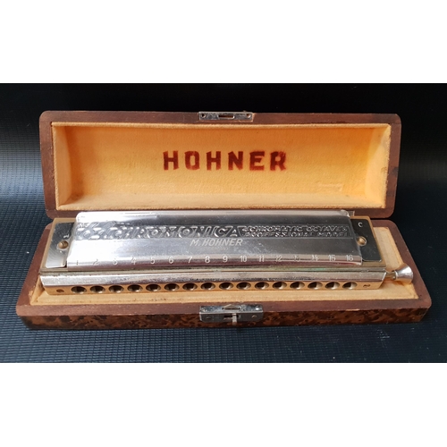 410 - HOHNER 64 HARMONICA
in a fitted case