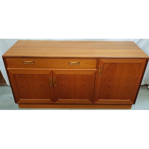 571 - G PLAN TEAK SIDEBOARD
with a moulded top above an arrangement of a long drawer, pair of cupboard doo... 