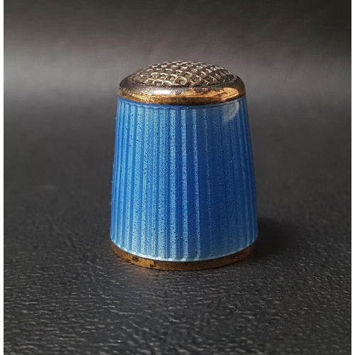 182 - NORWEGIAN SILVER AND BLUE ENAMEL THIMBLE
by Aksel Holmsen, with gilt rims and interior