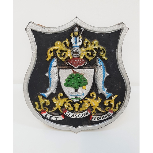 293 - GLASGOW COAT OF ARMS
on a shield shaped steel plaque with a wood stand, 18cm high