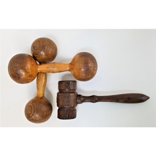 303 - PAIR OF VINTAGE WOOD DUMBELLS
of usual form, 22cm long, together with a vintage turned gavel, 24cm l... 