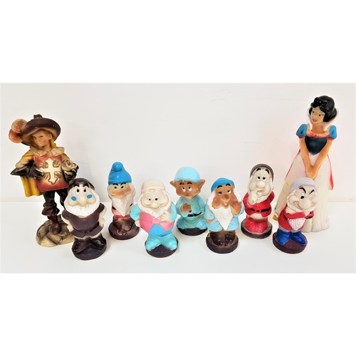 312 - VINTAGE SET OF PLASTIC SQUEAKY SNOW WHITE AND THE SEVEN DWARFS TOYS
together with a composition figu... 