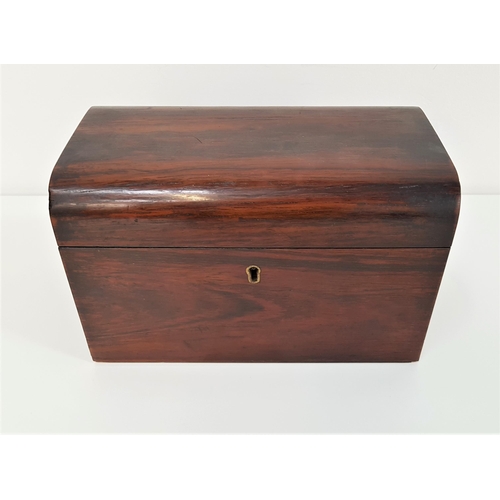 319 - 19th CENTURY ROSEWOOD TEA CADDY
with a domed lid opening to reveal a foil lined interior and two lid... 