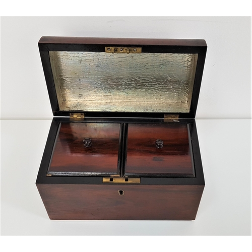 319 - 19th CENTURY ROSEWOOD TEA CADDY
with a domed lid opening to reveal a foil lined interior and two lid... 