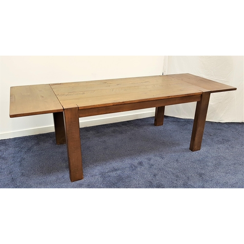 461 - LARGE OAK DINING TABLE
with a plank top and extending end sections, standing on plain supports, 240.... 