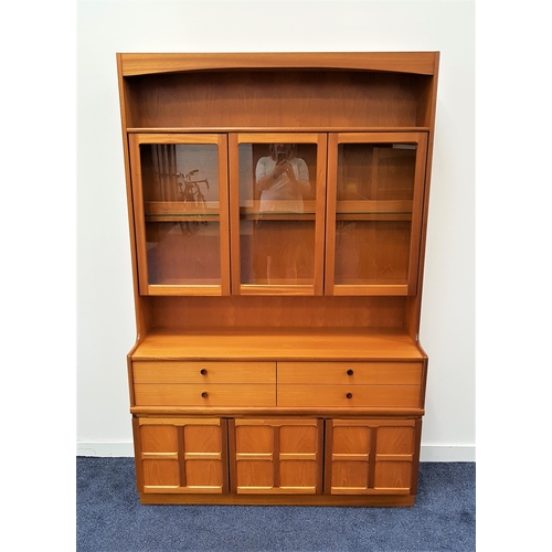 464 - NATHAN TEAK ILLUMINATED SIDE CABINET
with an upper open shelf above three glazed doors, the base wit... 