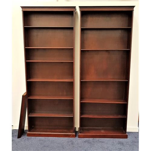 478 - PAIR OF LARGE MAHOGANY BOOKCASES
with a moulded top and dentil cornice, each with six shelves, stand... 