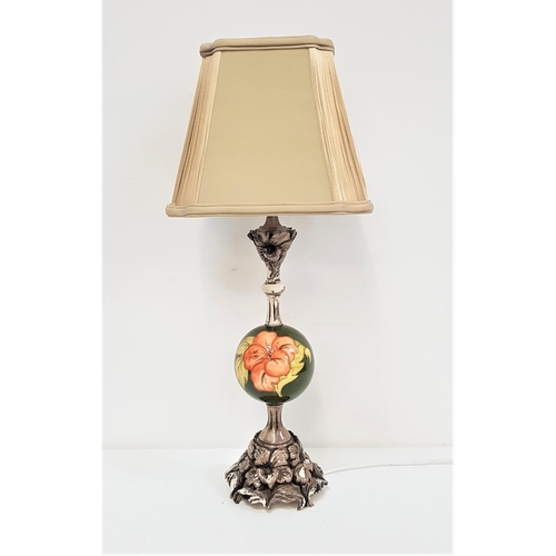 235 - MOORCROFT TABLE LAMP
with a central pottery bulbous stem, decorated in the hibiscus pattern with a g... 