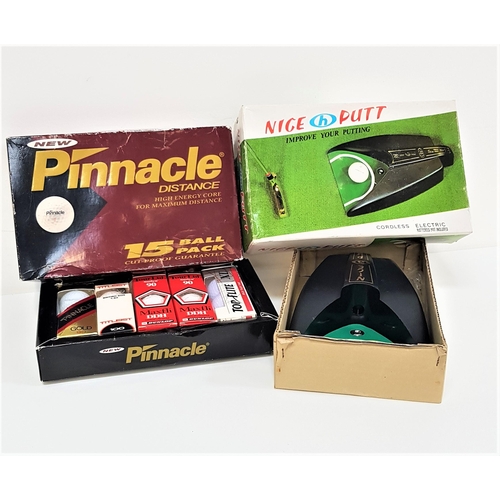 389 - GOLFING INTREST
an electronic putting trainer, Nice Putt, boxed, together with a boxed set of Pinnac... 