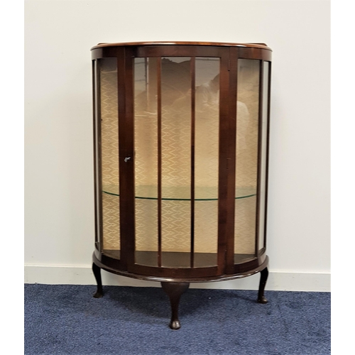 471 - 1950s MAHOGANY BOW FRONT DISPLAY CABINET
with a raised back above a central glazed door flanked by g... 