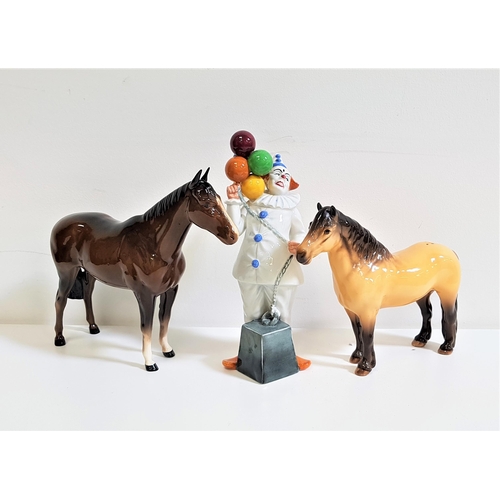 202 - ROYAL DOULTON BALLOON CLOWN FIGURINE
HN2894, 23.5cm high, a Beswick Highland pony, 17.5cm high and a... 