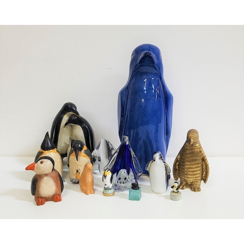 206 - SELECTION OF THIRTEEN PENGUINS
including a large blue pottery example, salt and pepper set, three gl... 