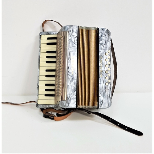 375 - HOHNER MIGNON II ACCORDIAN
with leather shoulder straps and a grey body